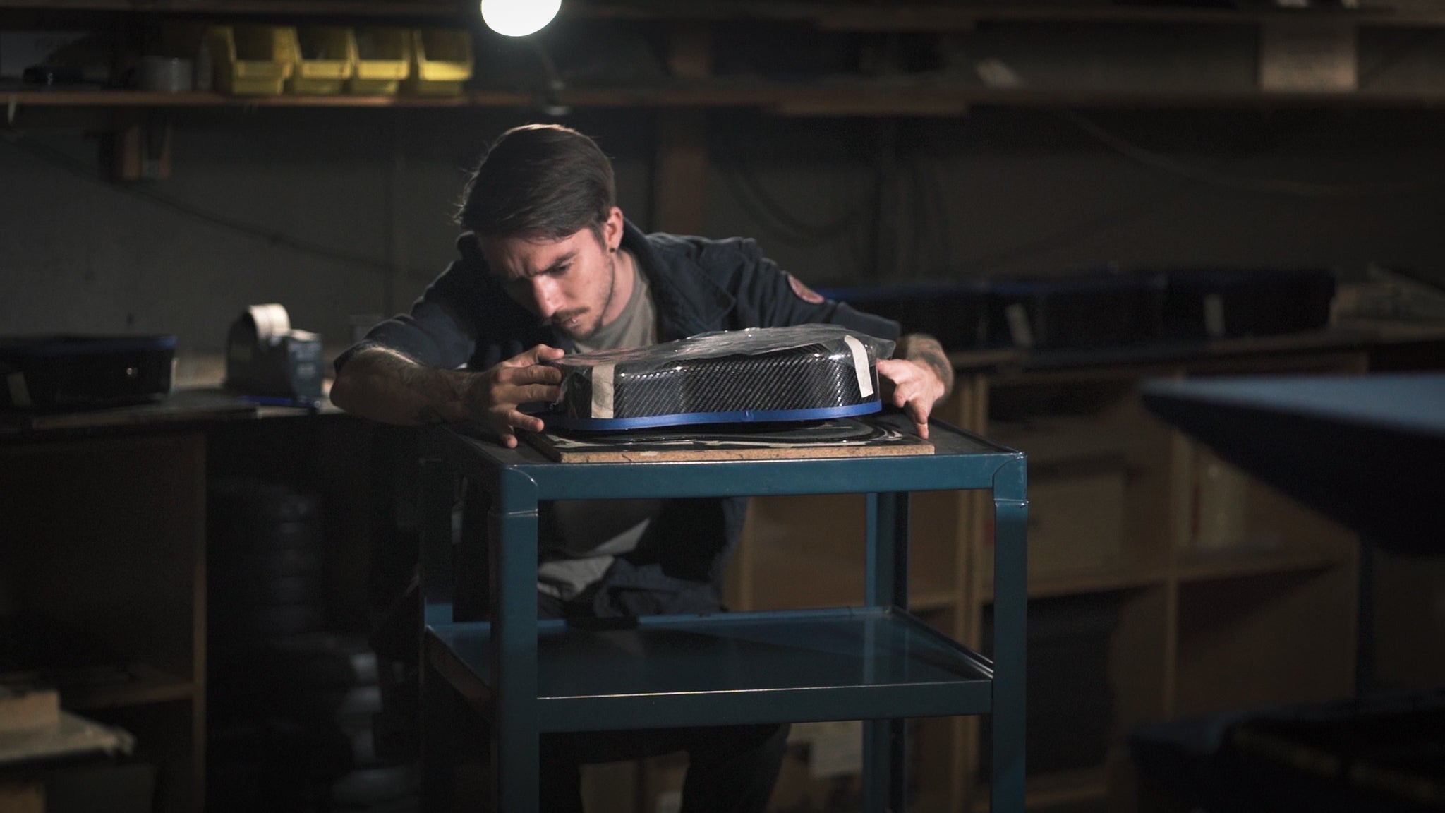 A KLŌS luthier assembles a KLŌS Travel Guitar 