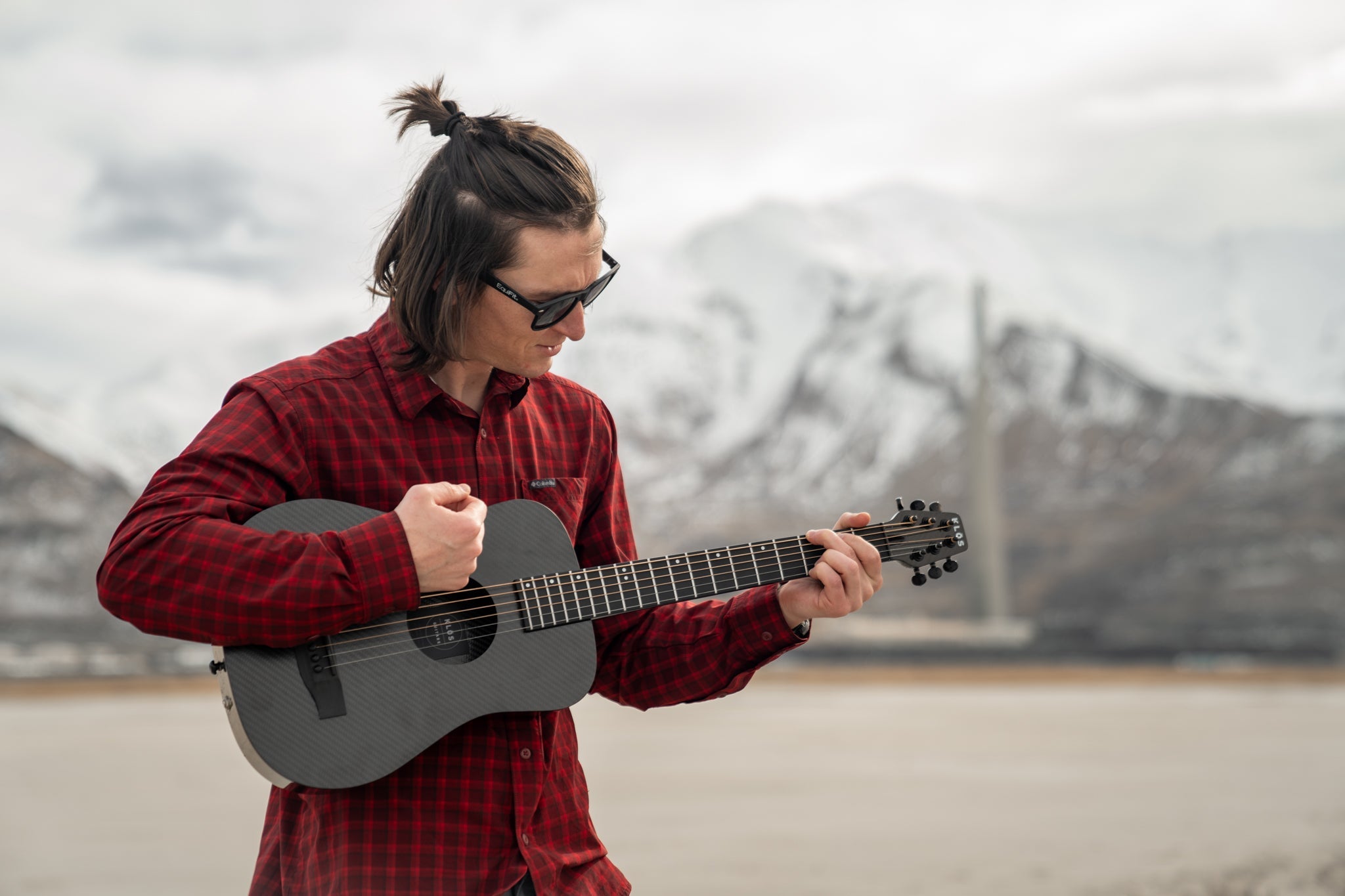 Why make guitars out of carbon fiber?